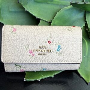 Coach genuine leather floral key holder wallet, like new, soft pebbled purse
